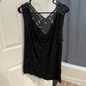 Black Tank top with black lace on back. No tags. Fits like an XL.